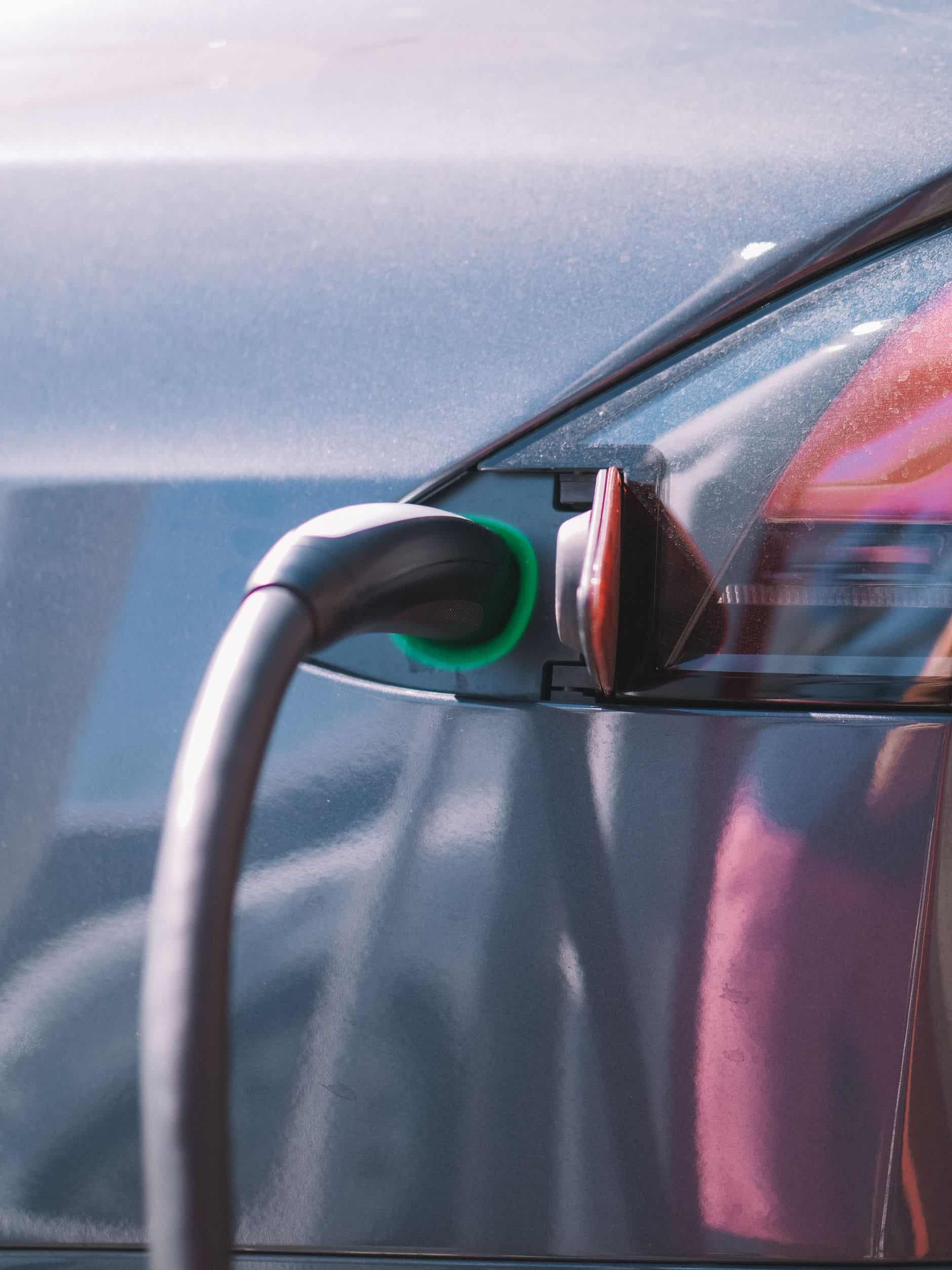 Charging cable plugged into an electric car