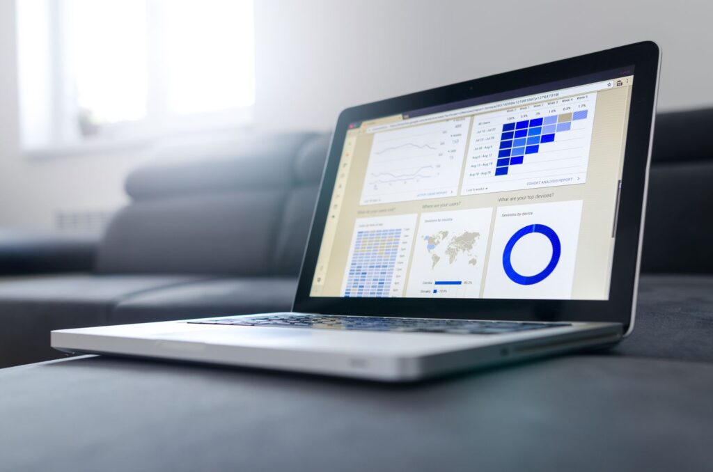 Laptop screen showing website analytics graphs reviewed during an SEO audit